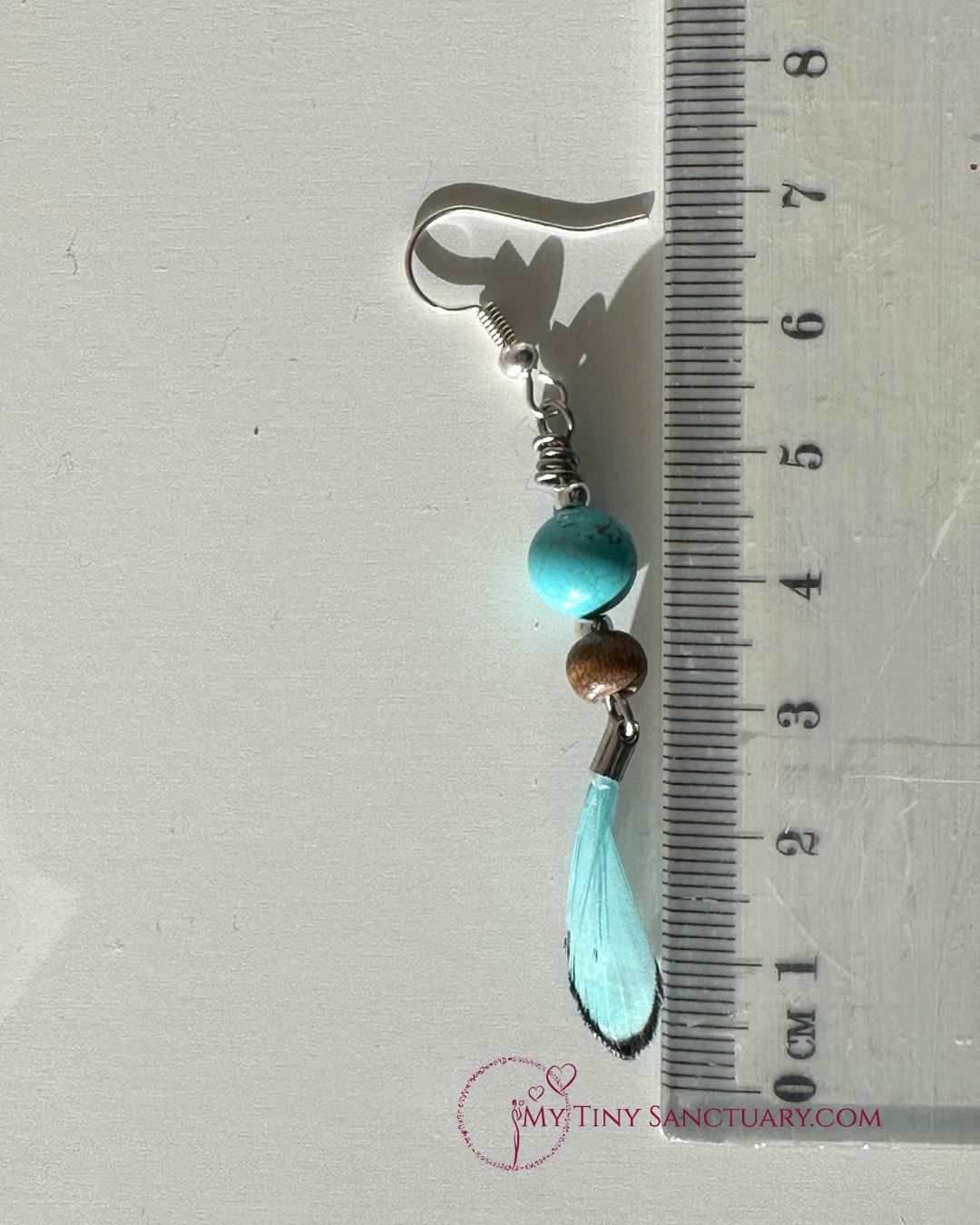 Turquoise Feather Earrings with Wood Beads and Howlite Stones - My Tiny Sanctuary