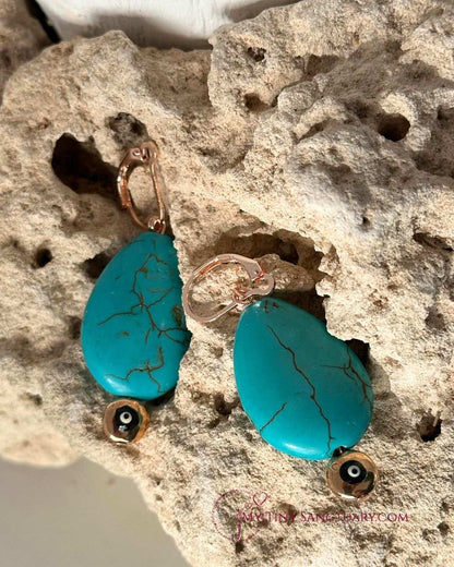 Les Boucles d'Oreilles en Howlite Turquoise et Œil de Mati en Or Rose