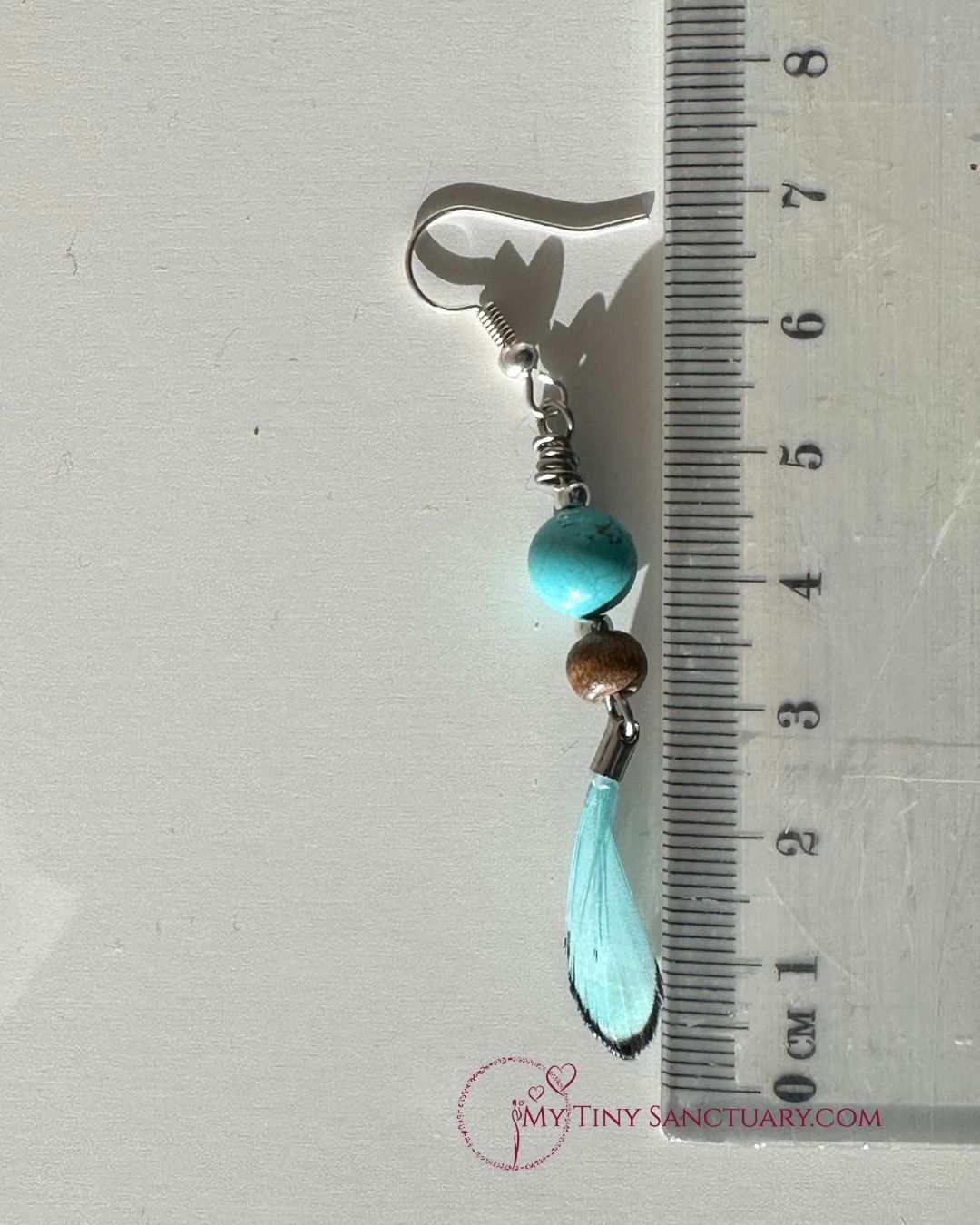 Turquoise Feather Earrings with Wood Beads and Howlite Stones