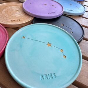 Aries Coaster - Hand-painted Aries Constellation Coaster in porcelain with fiery orange design and cork base.