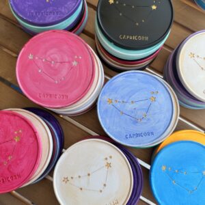 Capricorn Coaster - Hand-painted Capricorn Constellation Coaster in porcelain with gold design and cork base.